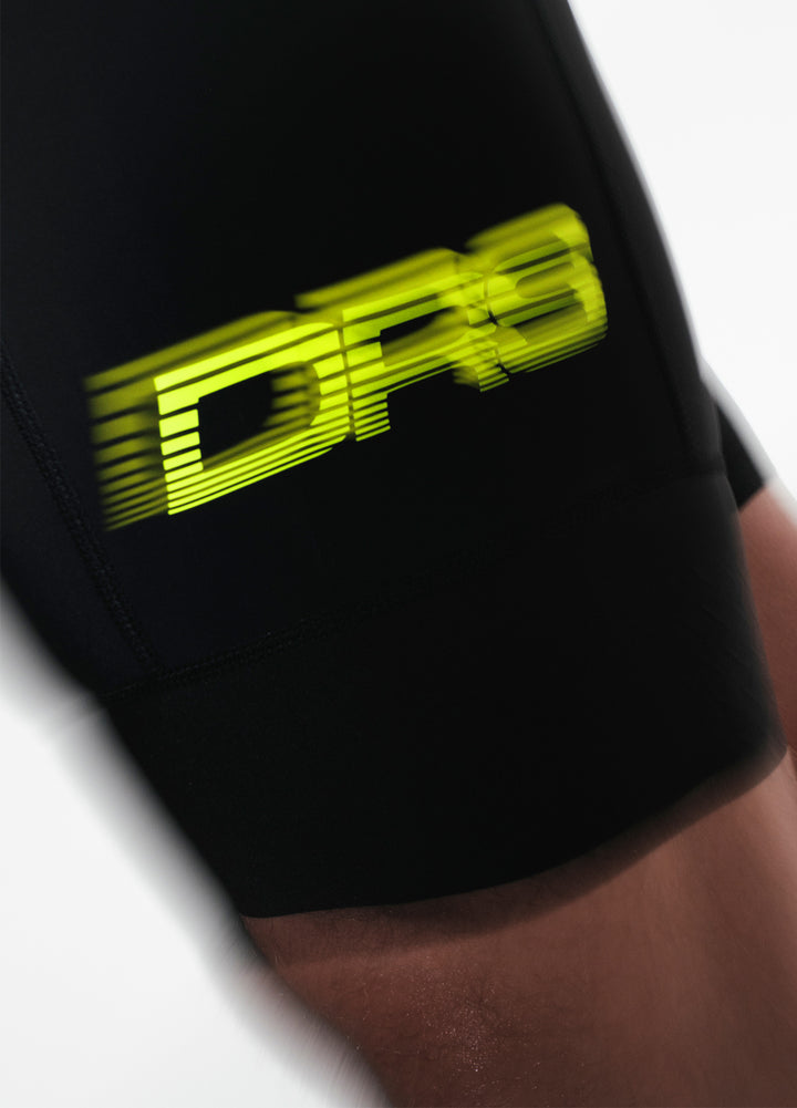 Black DRS cycling bibs with yellow 'DRS' logo on a white background