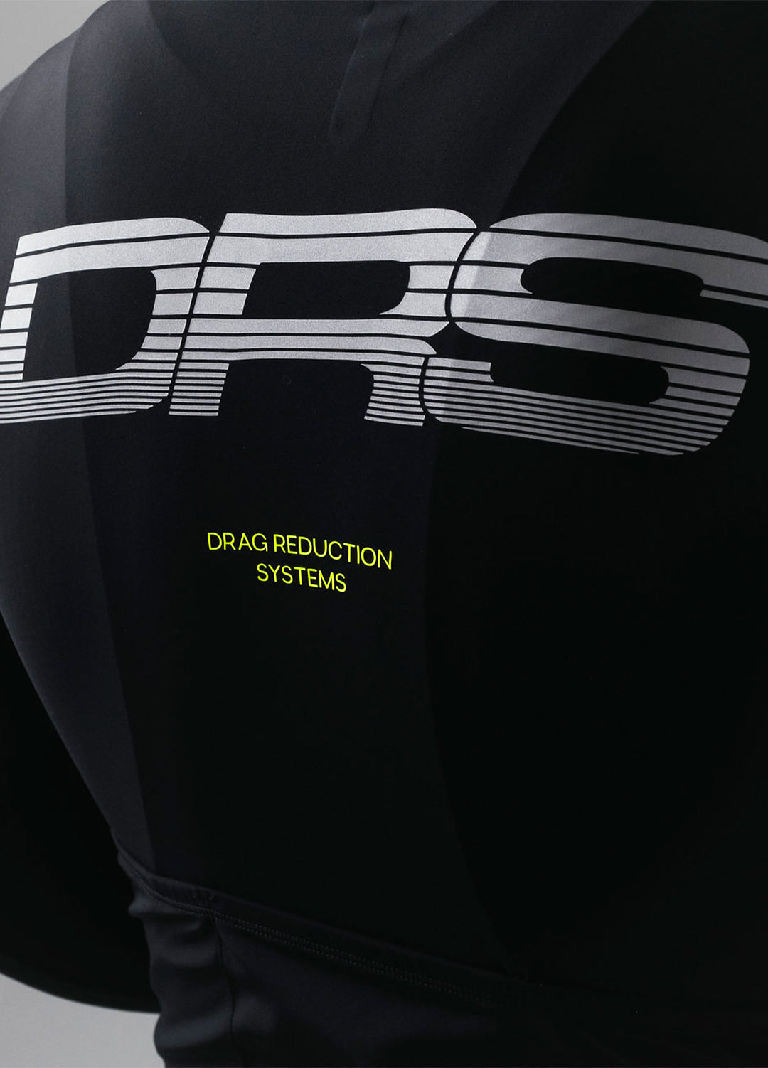 Black cycling jersey with 'DRS' logo and 'Drag Reduction Systems' text on a dark background