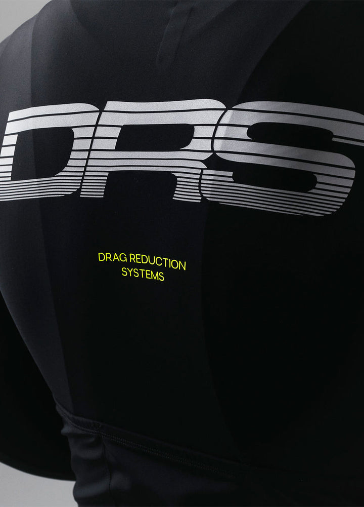 Black cycling jersey with 'DRS' logo and 'Drag Reduction Systems' text on a dark background
